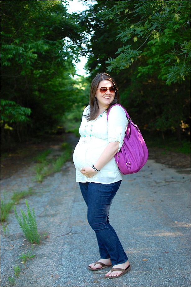 maternity style: mint tunic, jeans, purple bag, TOMS sunglasses